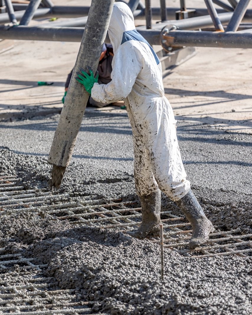 Concrete worker working in a field